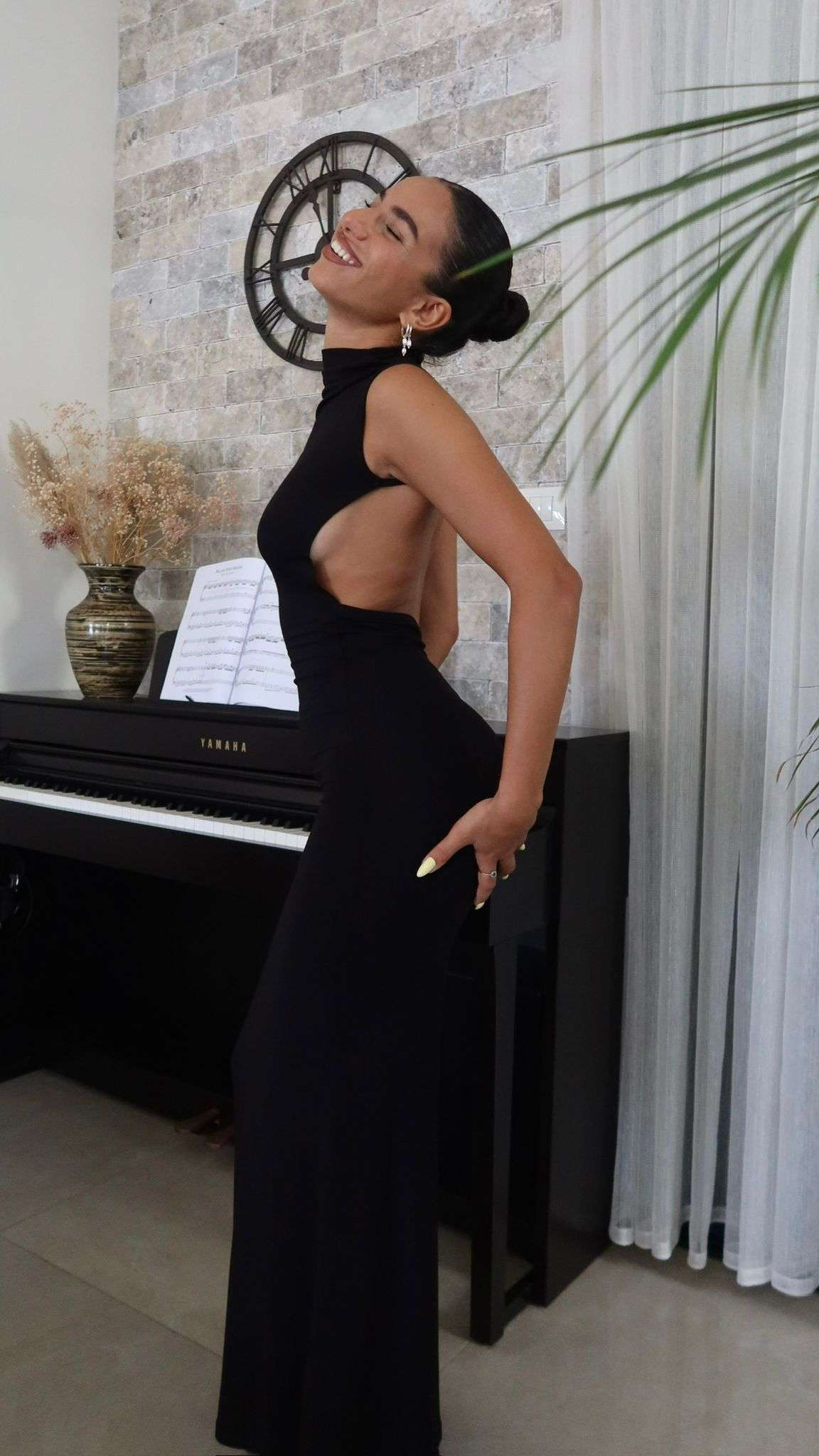 Couple dancing, the woman wearing an elegant rental dress